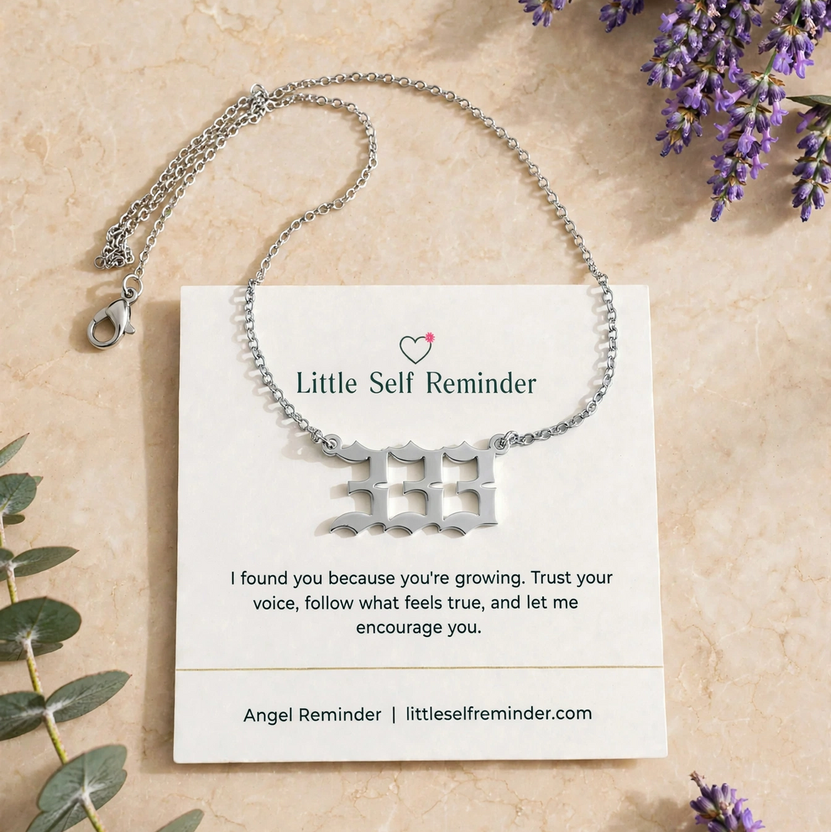 Silver 333 angel number necklace with an encouraging reminder to trust your voice, embrace personal growth, and remember you are supported.